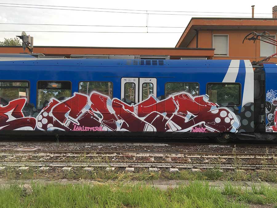 Chas Red Piece on Blue train
