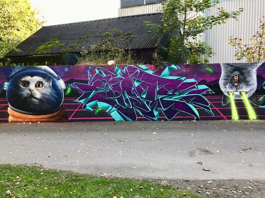 Space Cat Graffiti Mural with Purple graffiti 